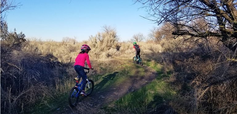 The kids enjoying some winter trail riding